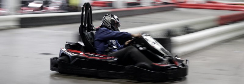 a black kart on a track